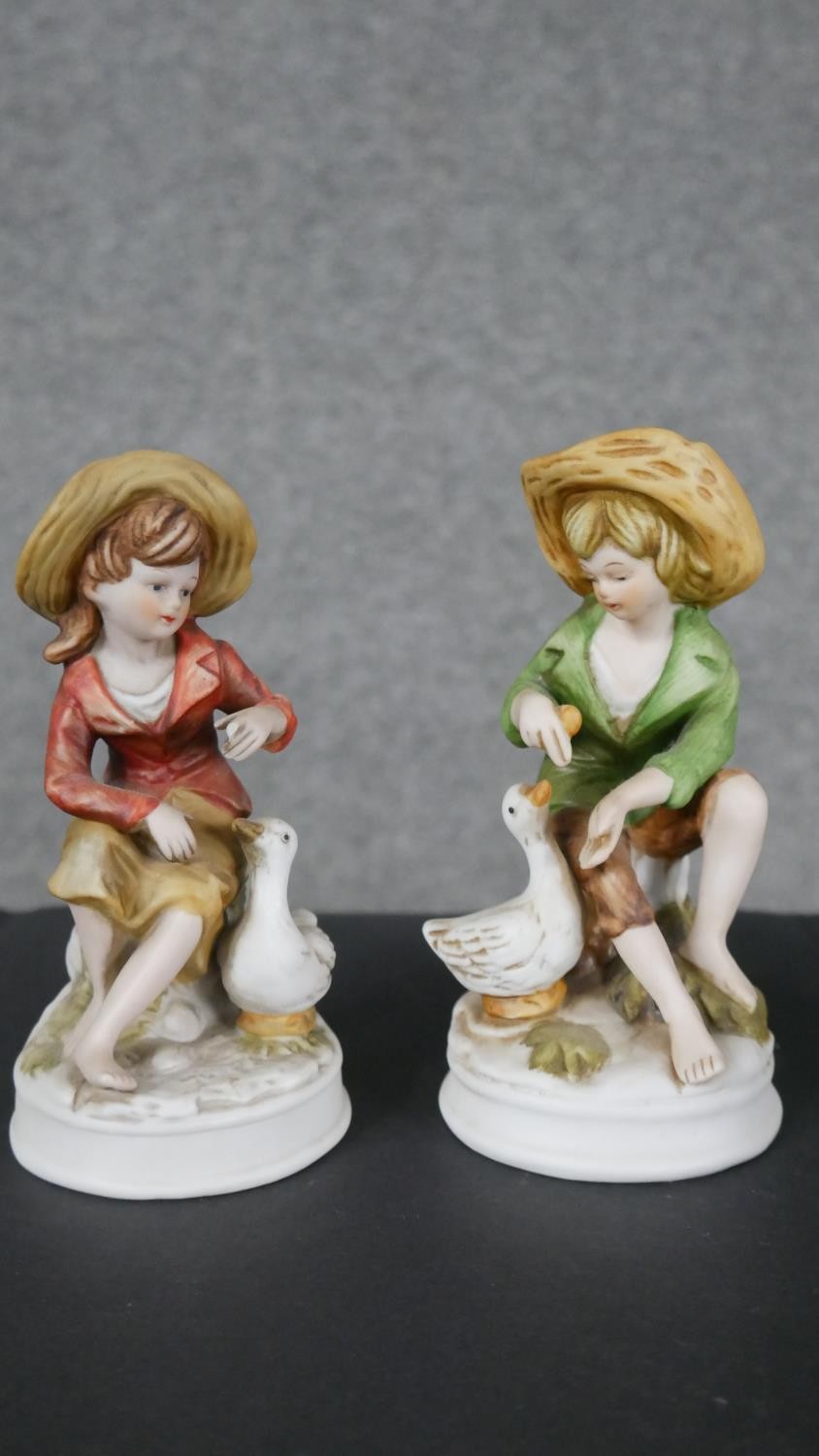 A collection of seven porcelain figures. Including two Alfro London hand painted figures. Makers - Image 2 of 6