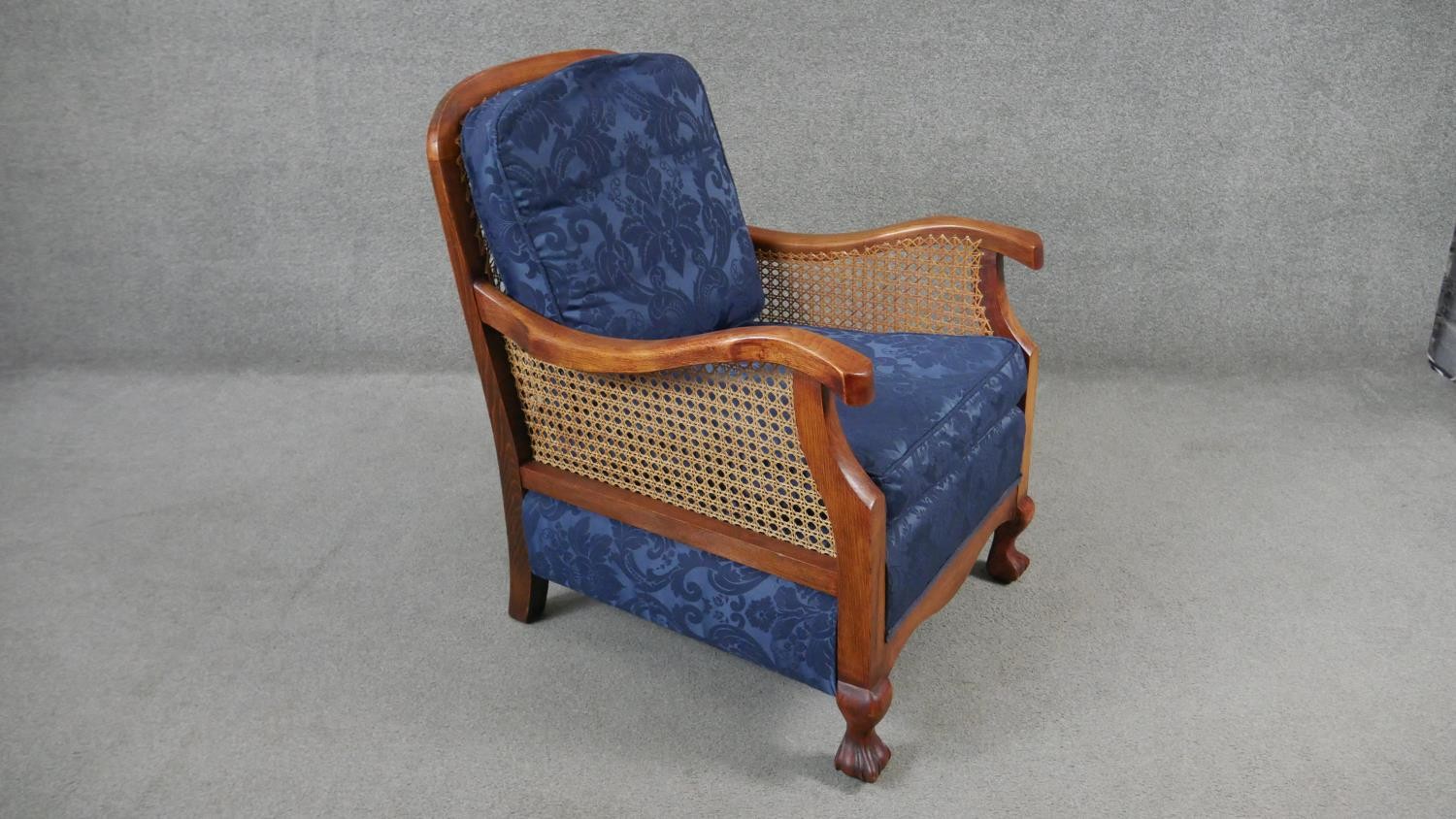A pair of mid century vintage beech bergere armchairs with caned backs and sides on carved - Image 3 of 8