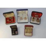 A collection of vintage cuff links. Including a pair of 22 carat gold plated opal doublet