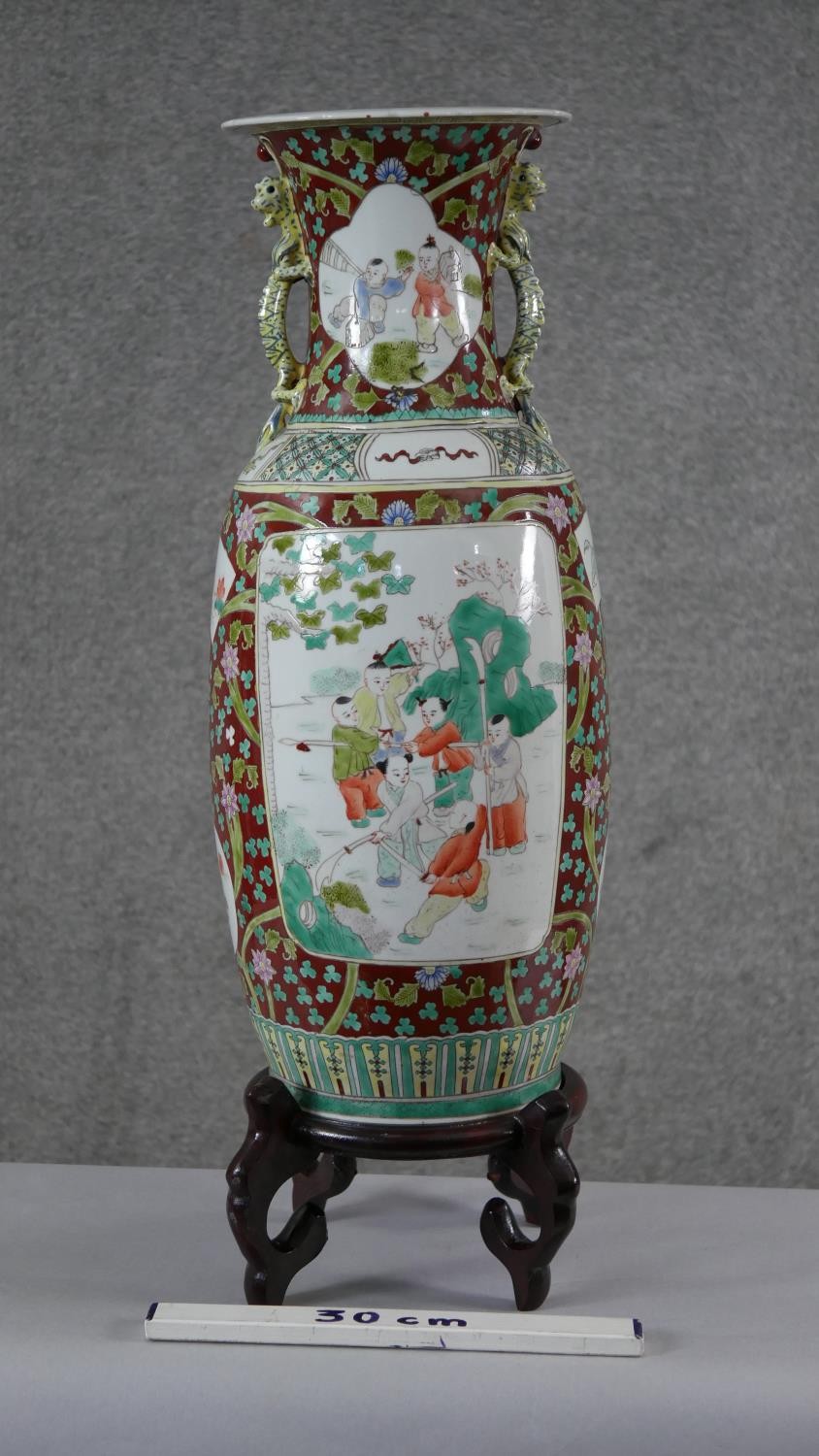 A large 19th century Chinese porcelain hand painted twin handled vase on carved harwood stand. The - Image 9 of 9