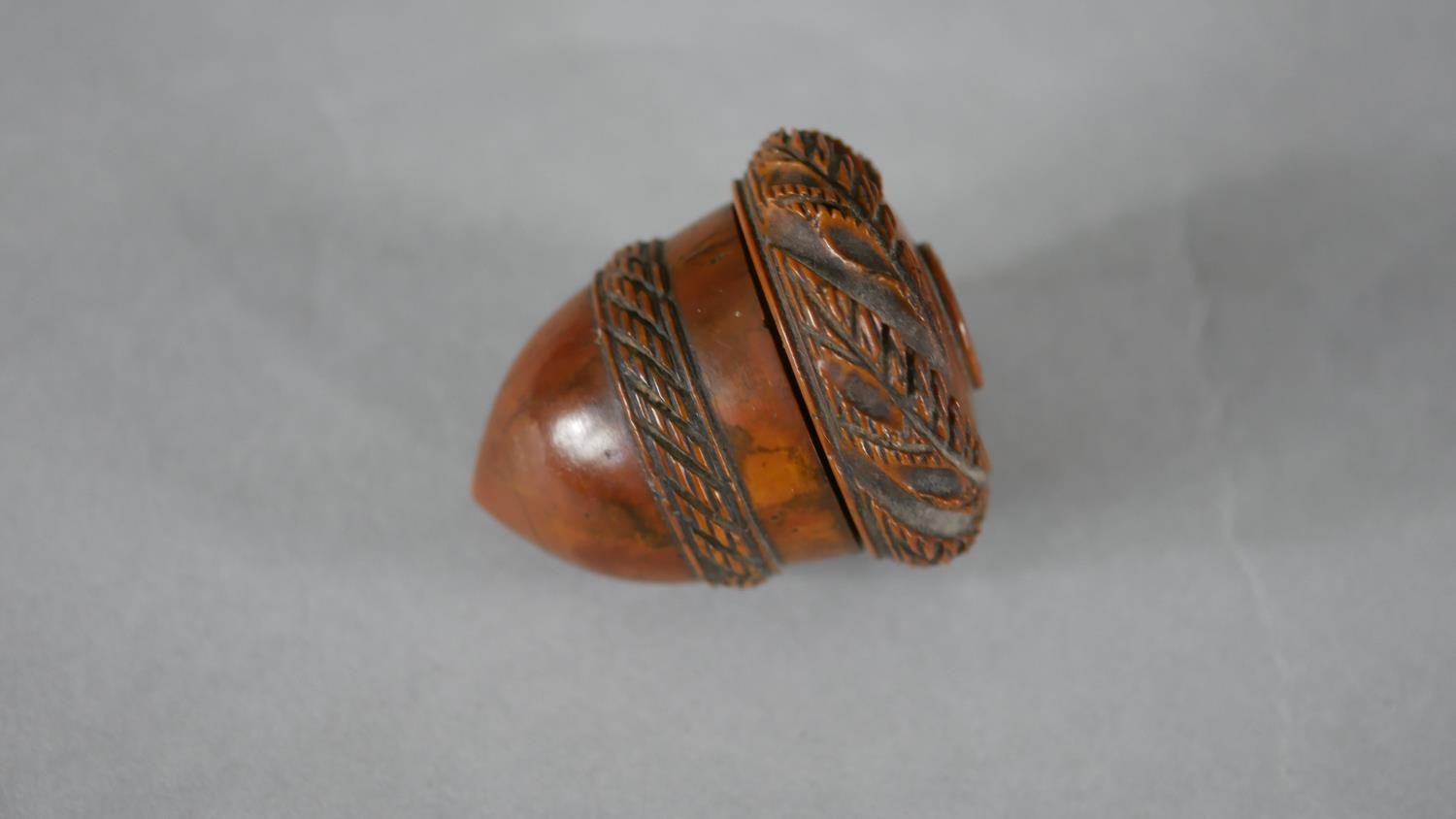 Three 19th century coquilla nut acorn design thimble holders. Each with a repeating foliate design - Image 5 of 7