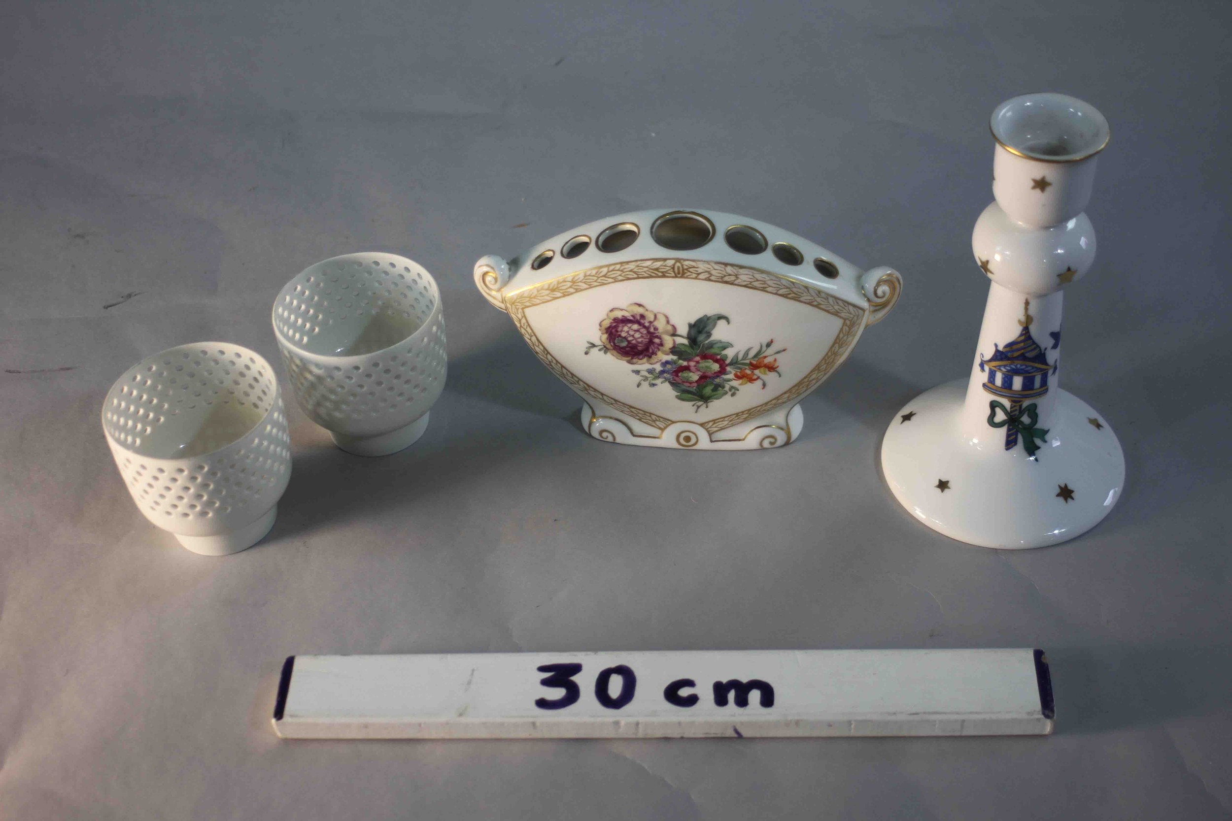 A collection of four pieces of porcelain. Including a gilded floral design flower vase, a Royal - Image 9 of 9