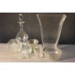 A collection of seven glass pieces. Including two Chance glass swirl design plates, a cut glass