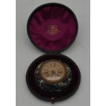 A leather cased 19th century black and white marble and gilt bronze circular travel clock by