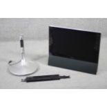 A Bang & Olufsen BeoVision 6 (27") LCD TV and brushed chrome swivel stand. 69CM (DIAGONAL)