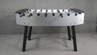 A vintage FAS table bar football set with five balls. H.88 W.147 D.75cm