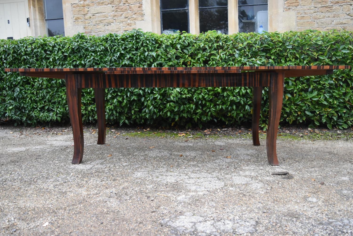 A contemporary zebra wood extending draw leaf dining table raised on square tapering shaped - Image 6 of 8