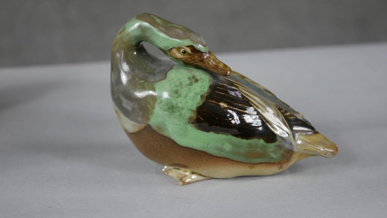 A collection of ceramics. Including two green and brown glazed art pottery ducks and a 18th - Image 2 of 8