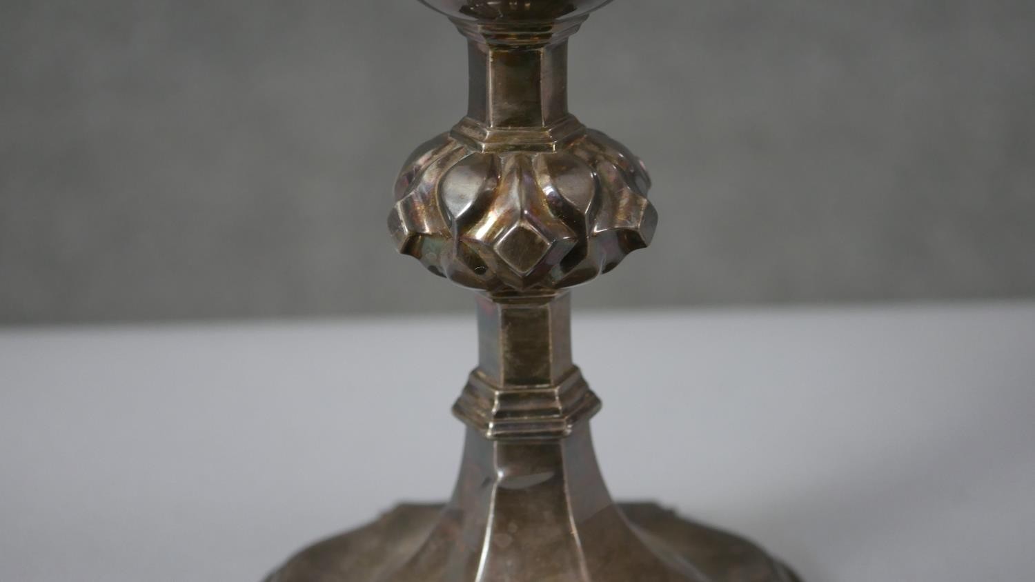 A Victorian silver communion cup. The lobed stem having raised bosses on a shaped plinth base. - Image 5 of 6