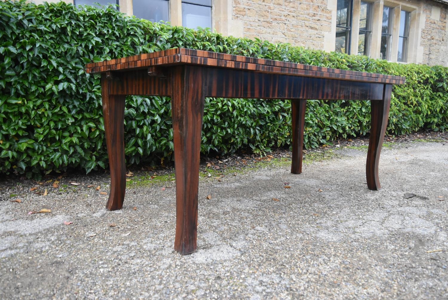 A contemporary zebra wood extending draw leaf dining table raised on square tapering shaped - Image 5 of 8