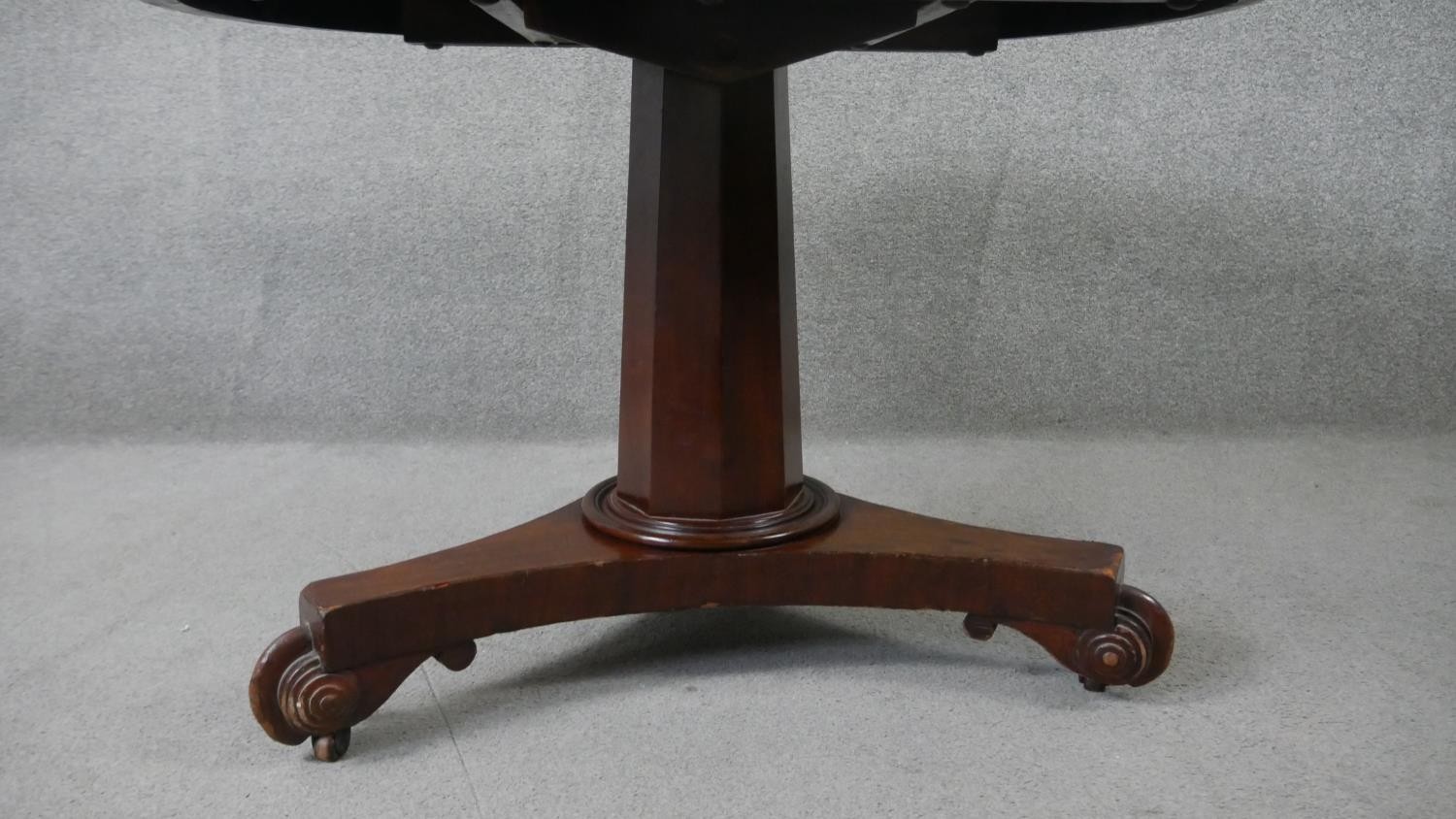 A 19th century mahogany tilt top dining table on faceted triform platform base. H.70 Diam.103cm - Image 4 of 5