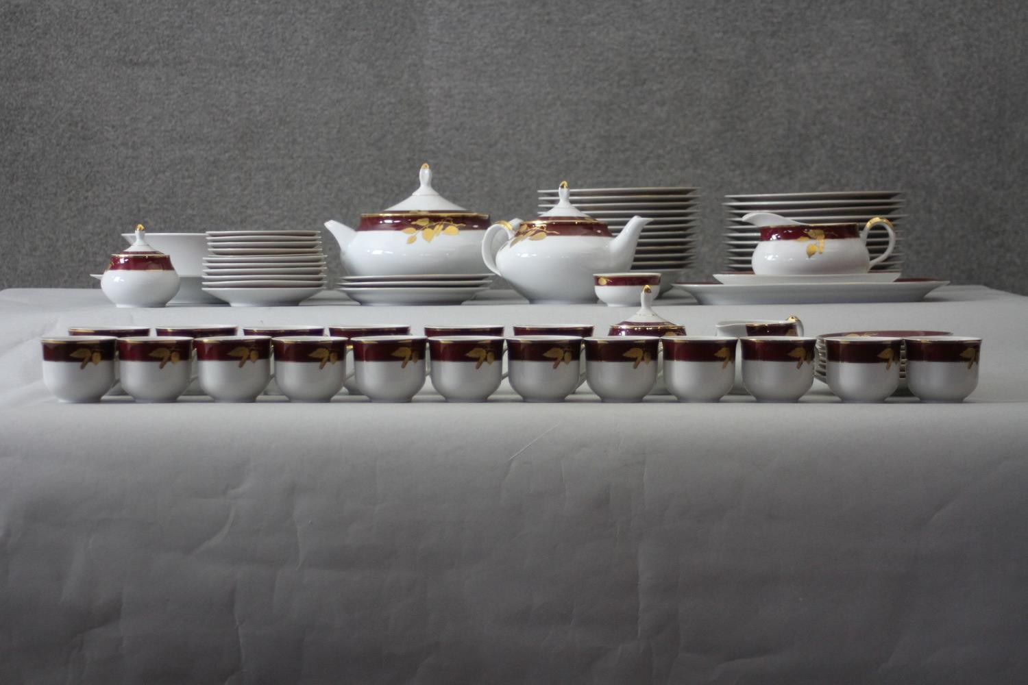 A Thun Czech porcelain twelve person part dinner set in maroon and gilt fruit design. Comprising - Image 5 of 15