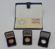 A collection of Danish commemorative coins and stamps. All in cases with paperwork.