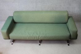 A William Plunkett sofa C.1960 in original Harris Tweed upholstery on polished aluminium frame.