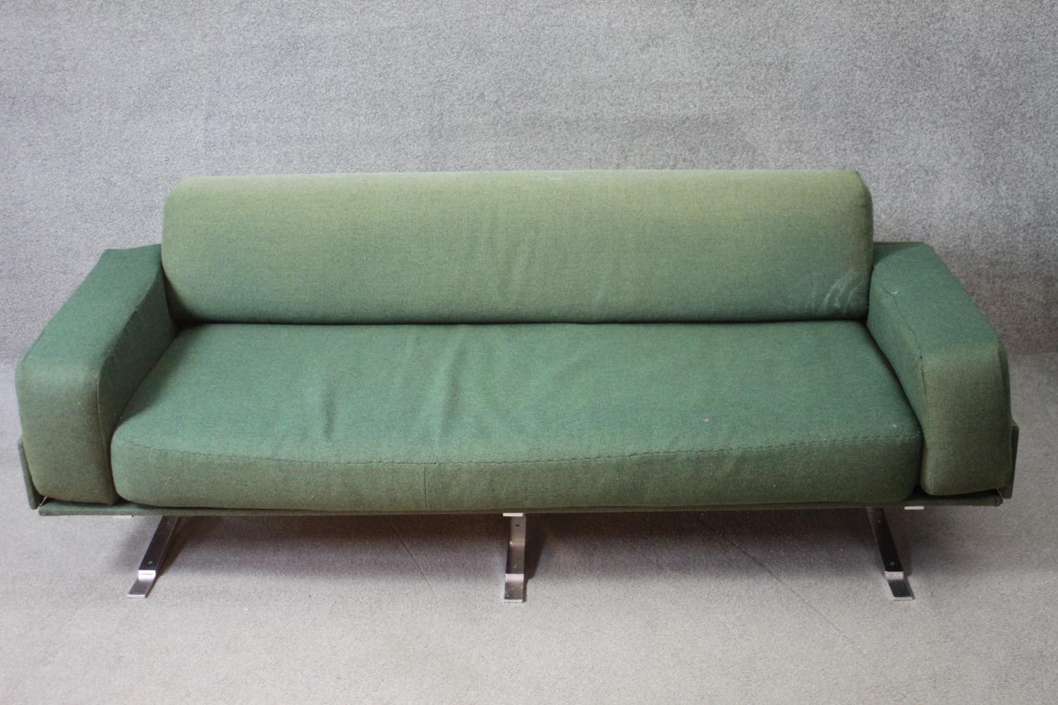 A William Plunkett sofa C.1960 in original Harris Tweed upholstery on polished aluminium frame.