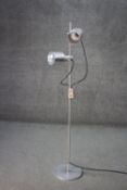 A vintage double spot aluminium floor lamp. H.55 Diam.27 cm.