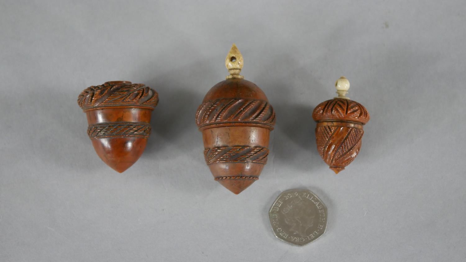 Three 19th century coquilla nut acorn design thimble holders. Each with a repeating foliate design - Image 7 of 7