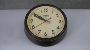 A vintage Smiths Sectric wall clock, with a signed white dial and brown bakelite case. Diam.29cm