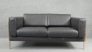 A Robin Day Forum sofa for Habitat in leather upholstery. H.70 W.147 D.80cm