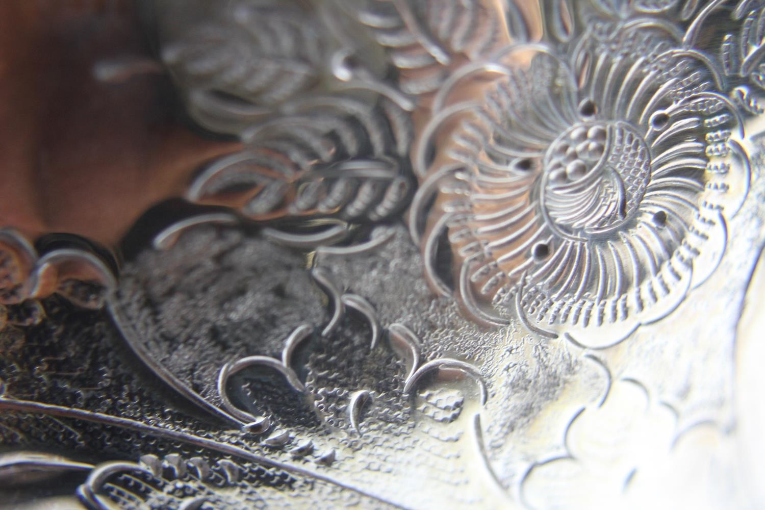 A hand chased floral design silver plate punch bowl and ladle. The pedestal bowl with twin lion head - Image 8 of 9