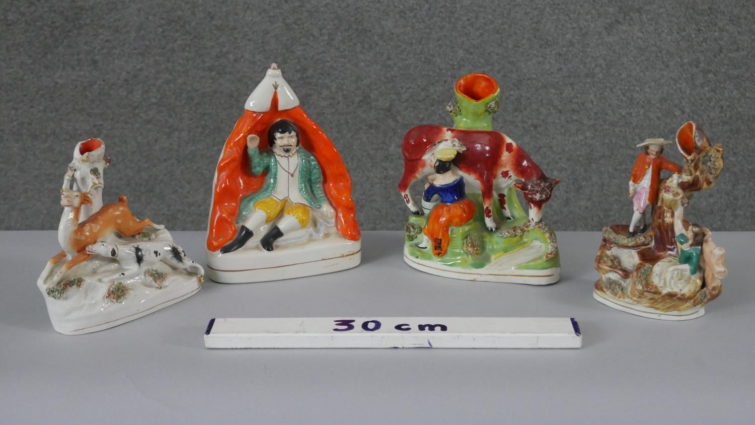 A collection of 19th century Staffordshire pottery figures. Including three spill vases, one with - Image 2 of 7