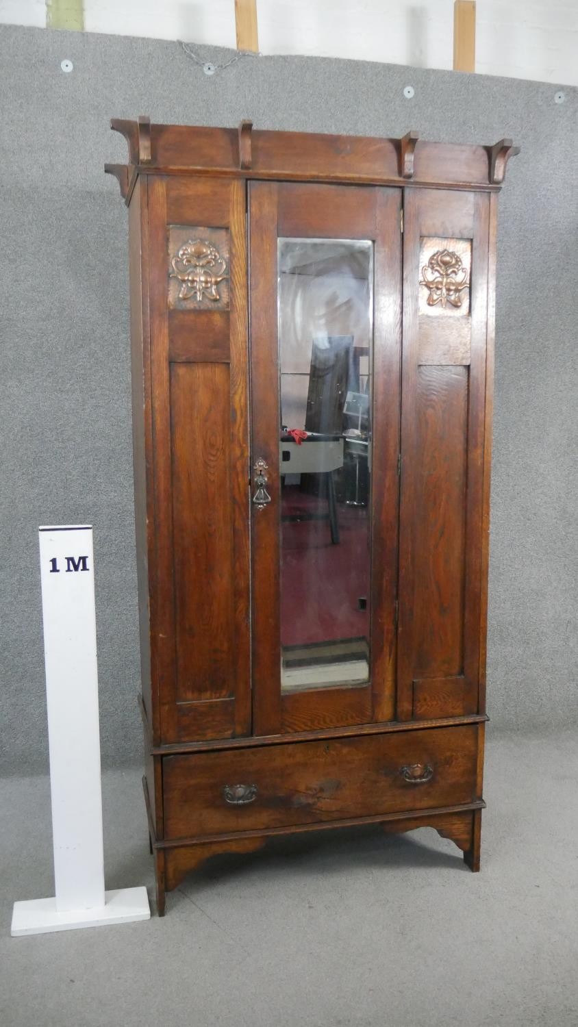 A late 19th century oak Arts and Crafts wardrobe with inset embossed copper panels. H.190 W.89 D. - Image 2 of 10