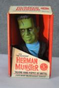 A vintage boxed 1964 Matel Herman Munster talking hand puppet. H.30 W.18 D.12 cm.