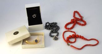 A collection of jewellery. Including a boxed Pandora stone set heart charm, a black opal doublet