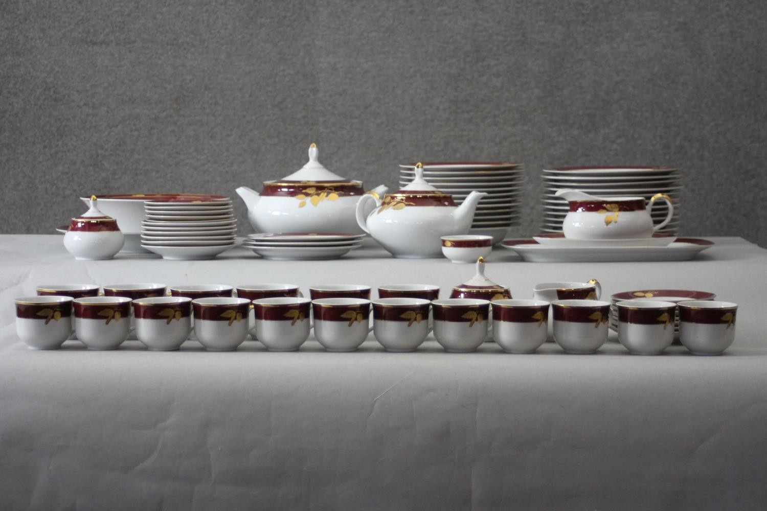 A Thun Czech porcelain twelve person part dinner set in maroon and gilt fruit design. Comprising - Image 2 of 15