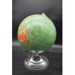 A vintage light up globe on chrome base. H.40 Dia.20cm (base)