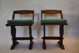 A pair of mid century oak country antique style dining chairs. H.70 W.45 D.36cm