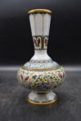 A Chinese enamelled cloisonne vase with all over floral decoration of bulbous form with flared