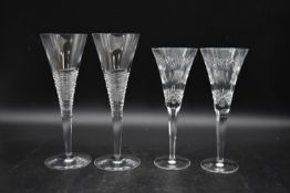 Two pairs of 20th century champagne flutes. To include a pair designed by Jasper Conran with