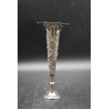 A early 20th century Woshing Chinese trumpet design silver spill vase decorated with relief