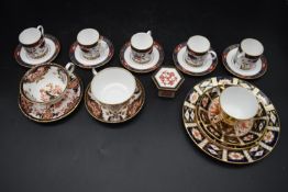 A collection of eight 20th century bone china cups and saucers. To include five coffee cups and
