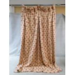 A pair of stylised floral design linen, lined curtains with repeating diamond pattern in cream, gold