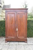 A late 19th century French figured walnut armoire with panel doors enclosing open space. H.215 W.140