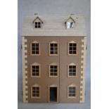 A contemporary Dartmouth three storey doll's house with six rooms. H.84 W.59 D.34cm