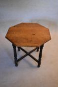 A mid century oak occasional table in the country antique style. H.54 W.61 D.61cm