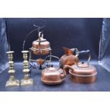 A collection of 19th century copper and brass items. To include three copper kettles with wrougt