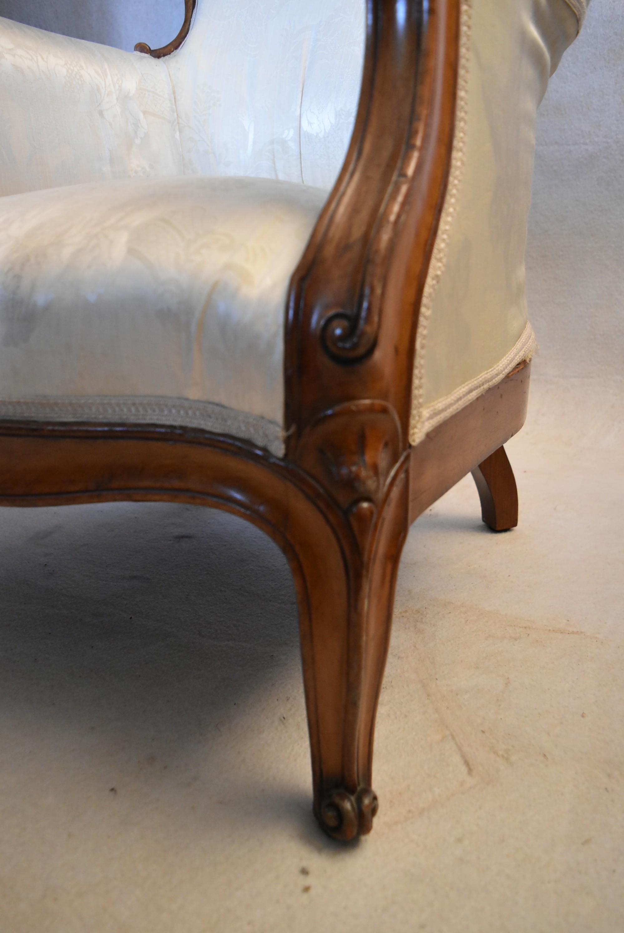 A 19th century carved walnut armchair in floral damask upholstery on cabriole supports. H.102 W.65 - Image 3 of 4