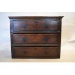 A 17th century country oak chest. H.76 W.98 D.62cm (small section missing to the top as