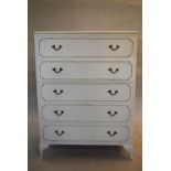 A mid century white painted chest of drawers. H.103 W.78 D.34cm