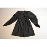 A black Ede and Ravenscroft graduation gown, with label of maker to the inside. H.120cm / Size 49.