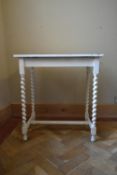 A white painted mid century side table on barley twist supports. H.74 W.70 D.43cm