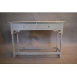 A mid century painted console table in the country antique style. H.75 W.114 D.40cm