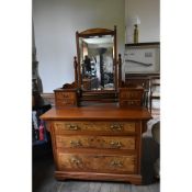 A late 19th century straight grain and burr walnut dressing table with swing bevelled plate above an
