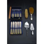 A collection of silver and silverplate. To include two silver brushes with embossed foliate