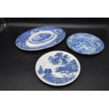 A collection of three blue and white Wedgwood plates, decorated in foliate designs, stamped to