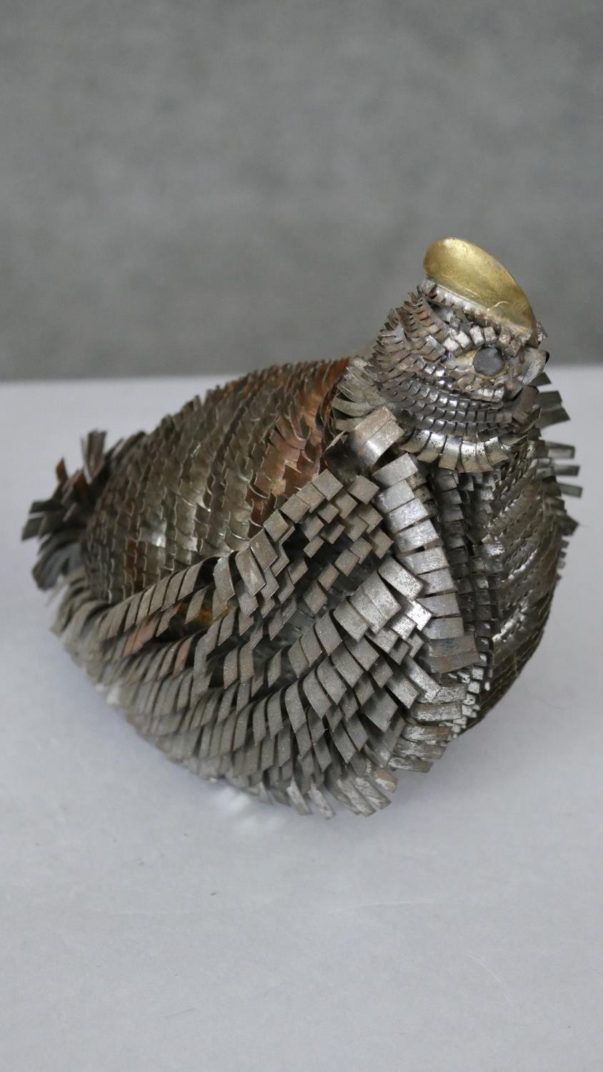 A gilded resin model of a flea on a pile of eggs along with a silvered covered model of a blue tit - Image 7 of 8